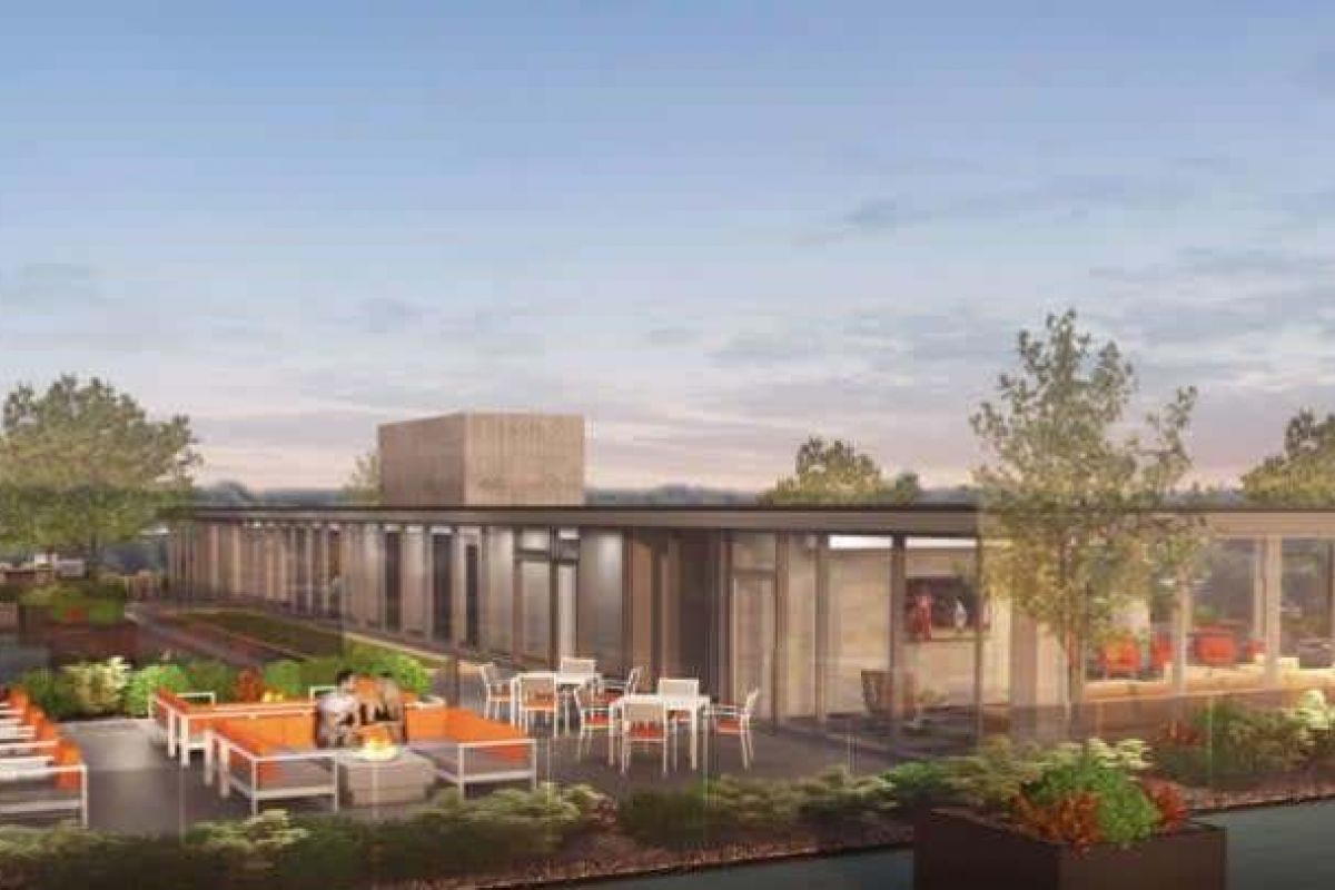 Optima Verdana luxury apartment with Modern rooftop patio at Optima Verdana with outdoor seating, fire pit, and greenery—an example of Wilmette IL luxury apartment amenities.