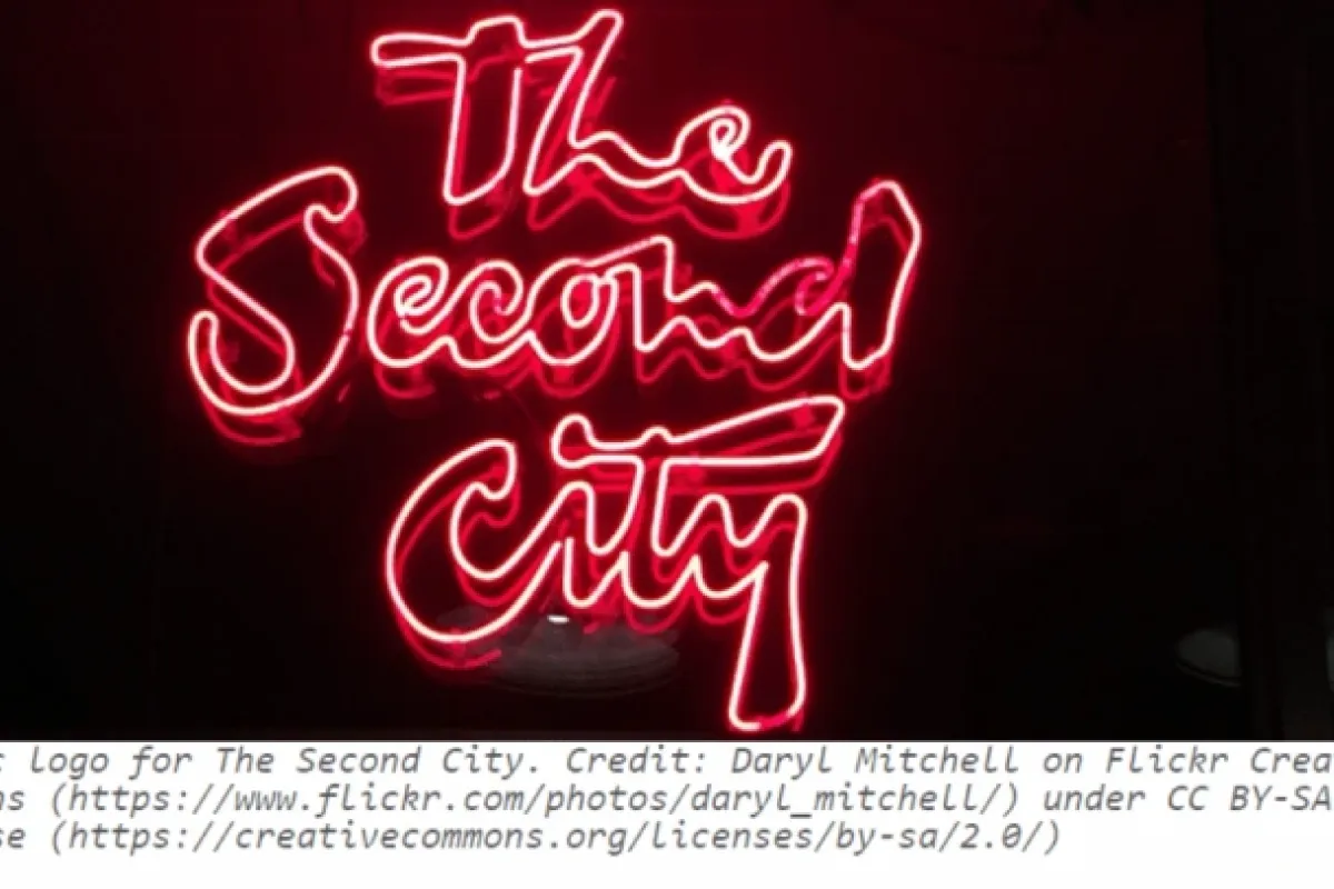 Optima Verdana luxury apartment with Neon pink "The Second City" logo glowing against a black background, celebrating the history of the iconic Chicago comedy club.