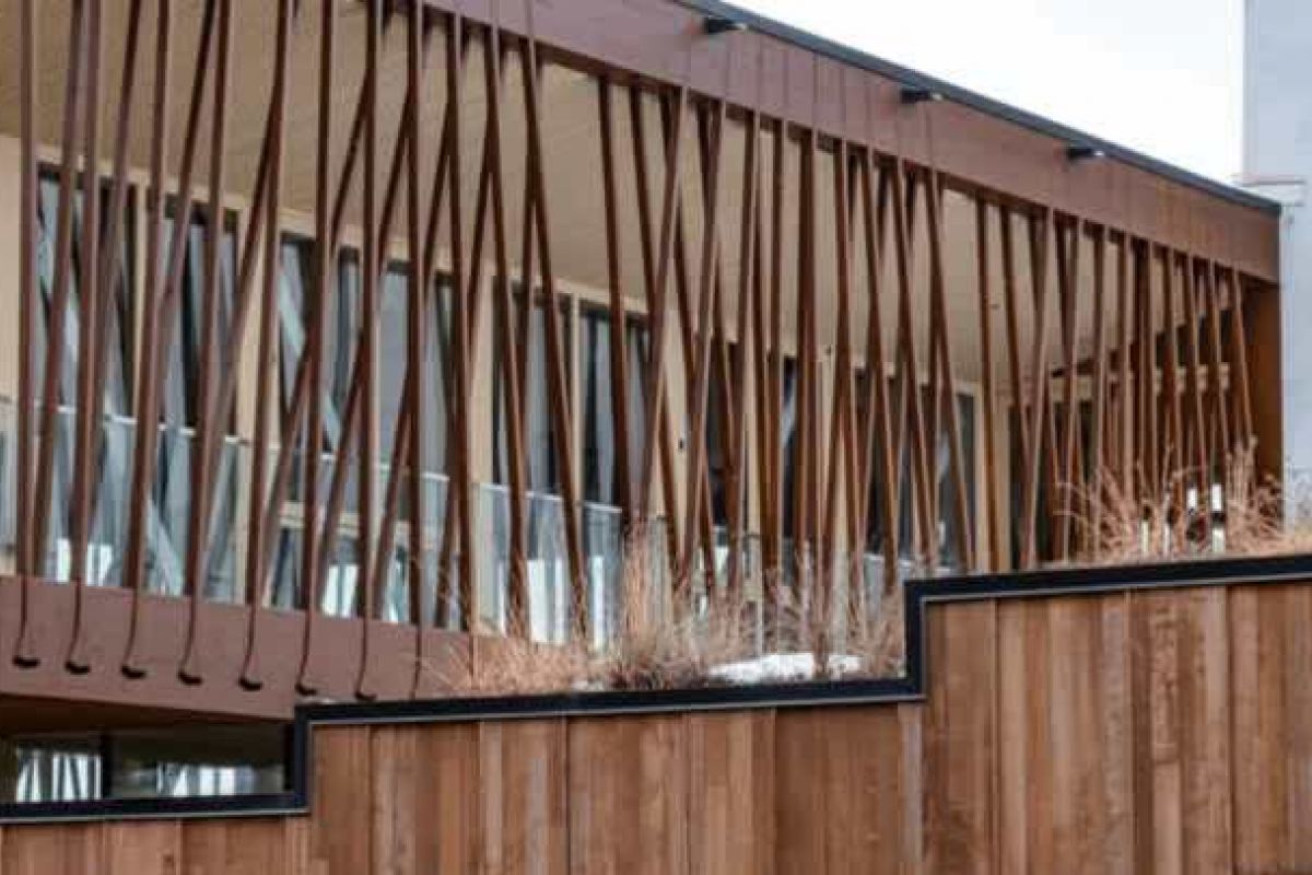 Optima Verdana luxury apartment with Contemporary building in Glencoe with wooden slats and paneled walls, near Writers Theatre and other local attractions.